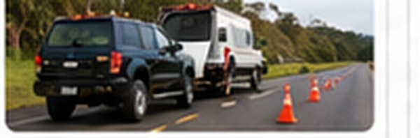 Roadside assistance with safety cones on the highway